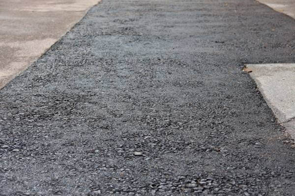 Driveway extension cost comparison by material Driveway extension costs based on material