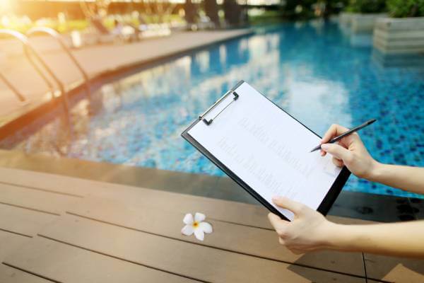 Pool remodel permit document being approved